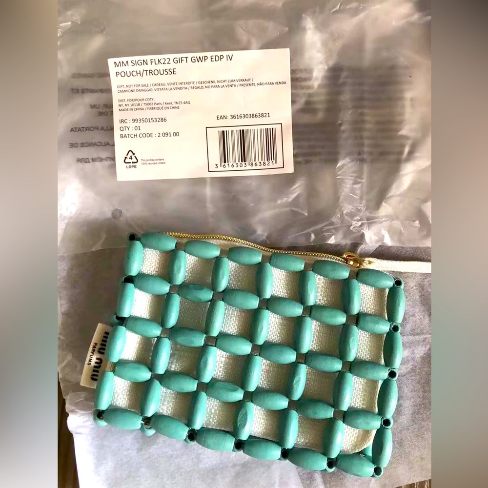 MIU MIU Novelty
Accessory Pouch. Light Teal Color. New